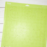 a dirty Cricut mat used in a tutorial for how to clean a Cricut mat
